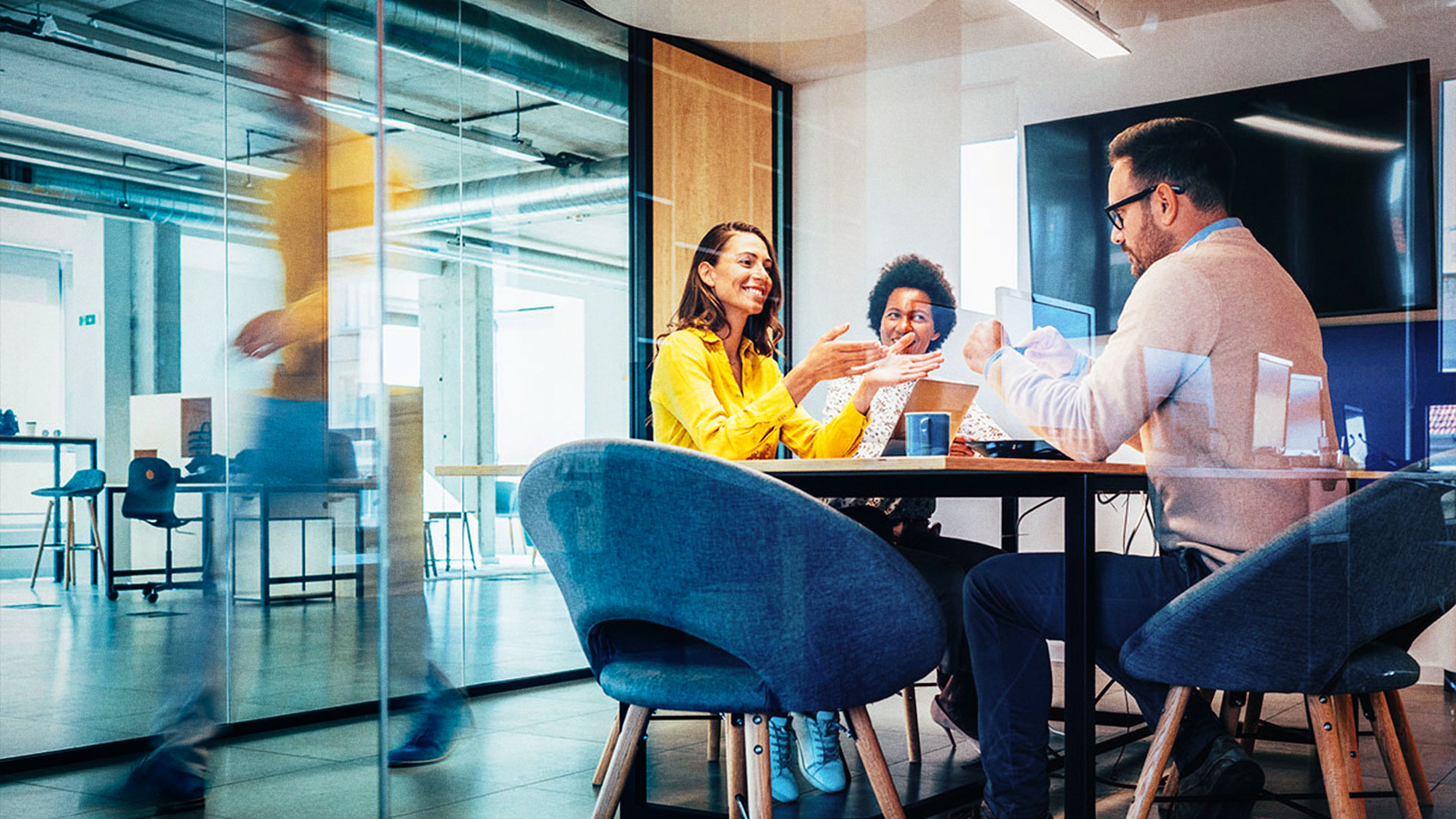 people talking in an office environment 